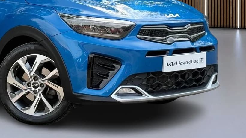 Dealer listing photo — the number plate replaced with a dealer-branded plate