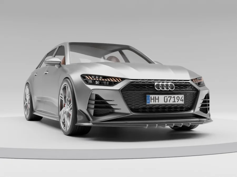 Silver performance estate, front three-quarter view on a soft studio floor, produced by Motuva Studio